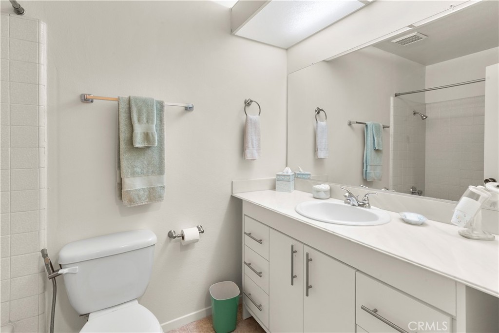 24142 Minnetonka Lane Lake Forest, CA 92630 - Photo 25 of 30 a bathroom with a toilet sink and mirror