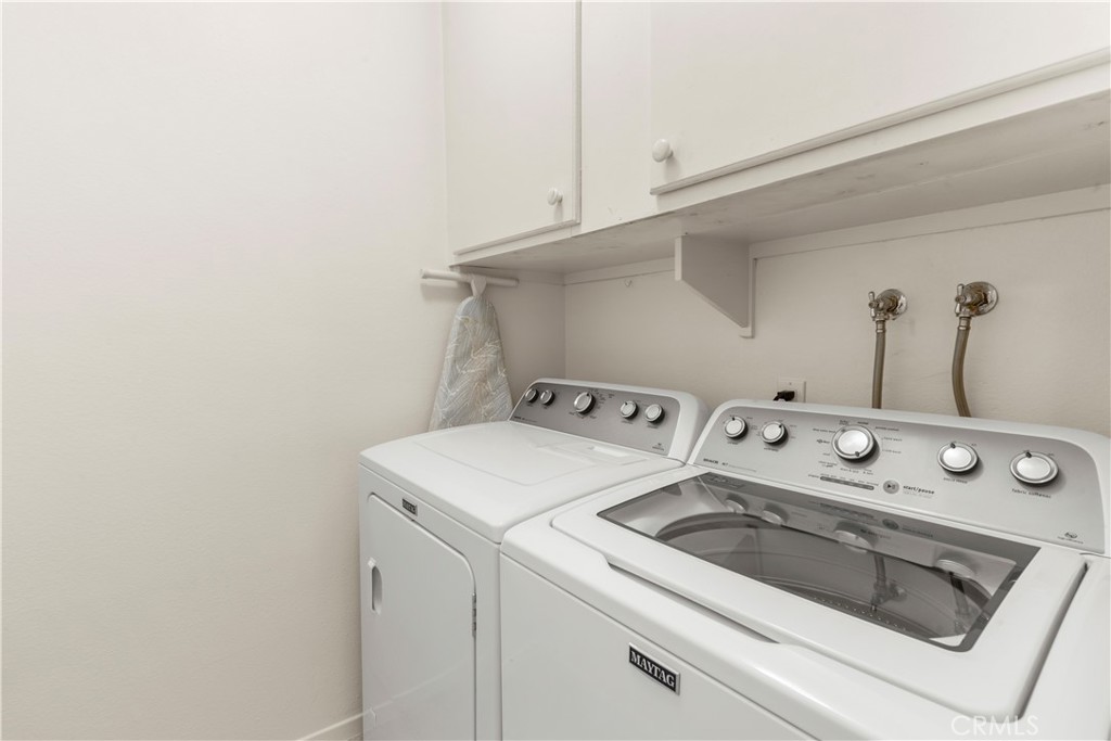 24142 Minnetonka Lane Lake Forest, CA 92630 - Photo 26 of 30 a utility room with dryer and washer