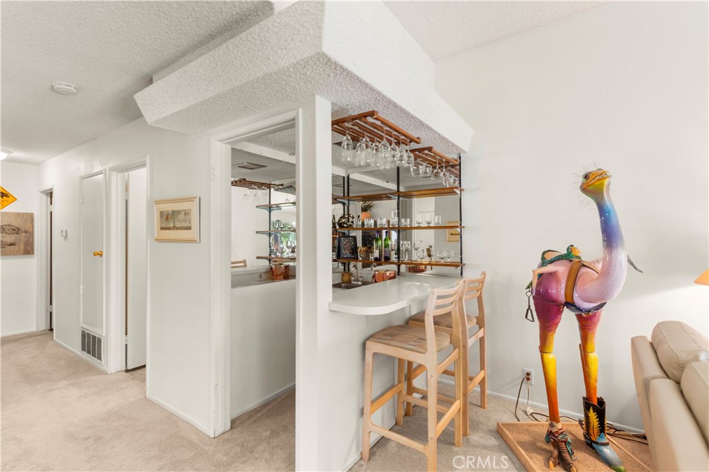 24142 Minnetonka Lane Lake Forest, CA 92630 - Photo 10 of 30 a dining room with furniture and a chandelier