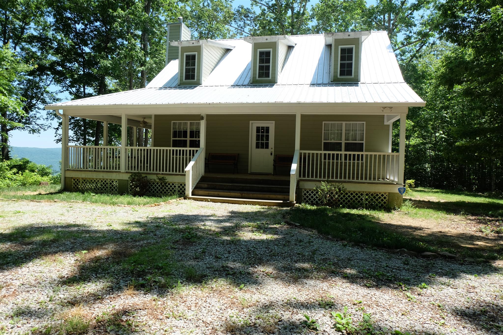 Bluff view home with wrap around porch.