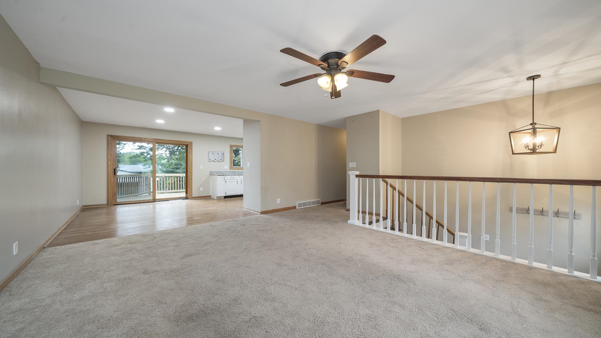 445 Rebecca Road Belvidere, IL 61008 - Photo 13 of 34 a view of a livingroom with a ceiling fan and window