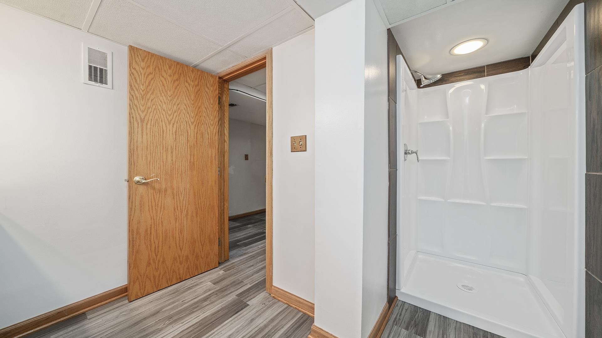 445 Rebecca Road Belvidere, IL 61008 - Photo 24 of 34 a bathroom with a shower and a glass door
