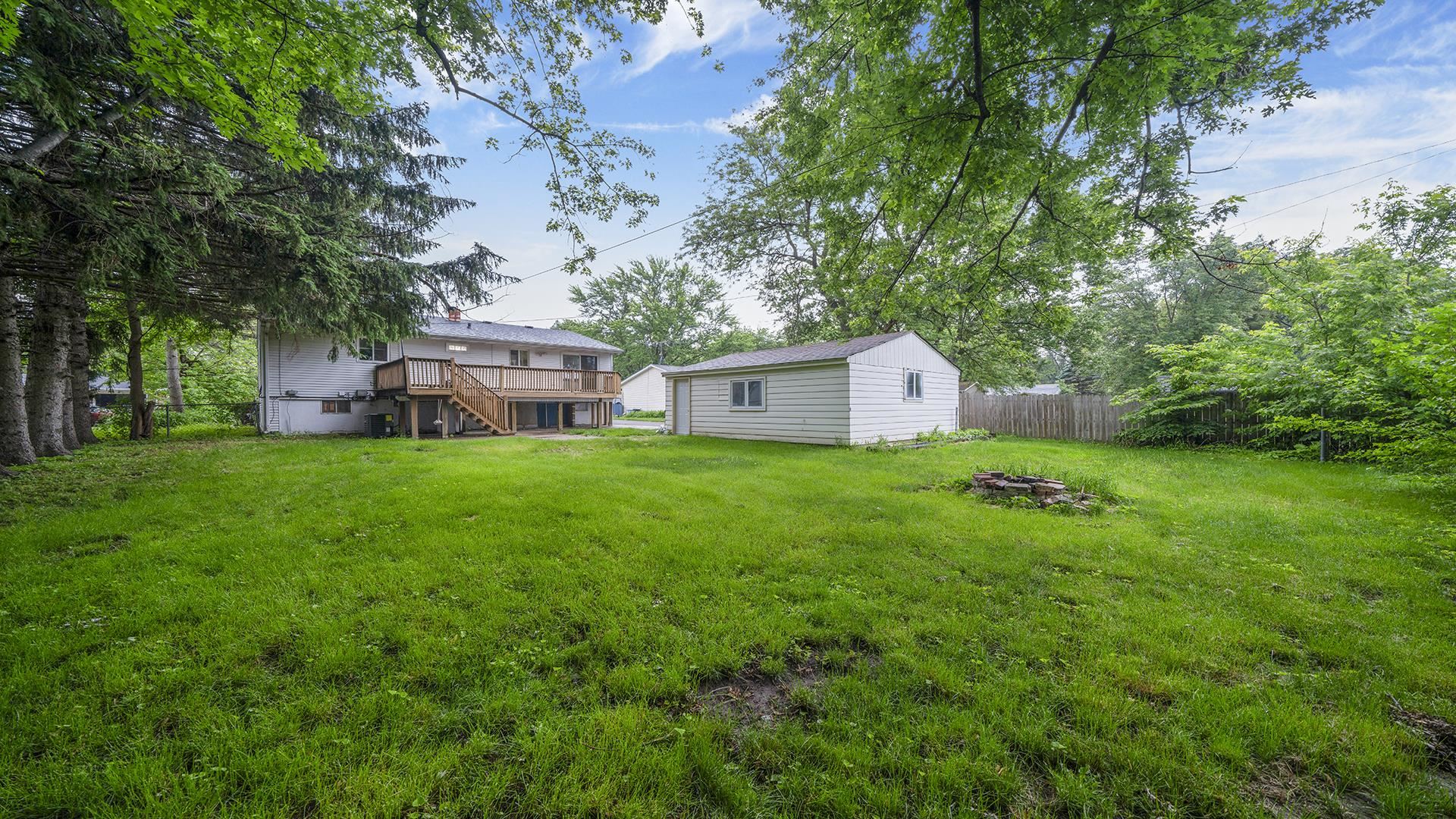 445 Rebecca Road Belvidere, IL 61008 - Photo 28 of 34 a house view with a sitting space and garden