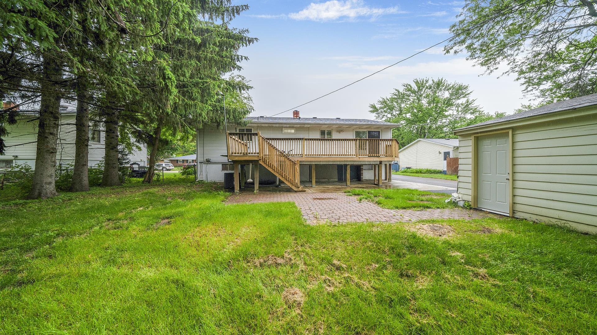 445 Rebecca Road Belvidere, IL 61008 - Photo 29 of 34 a view of a house with a big yard