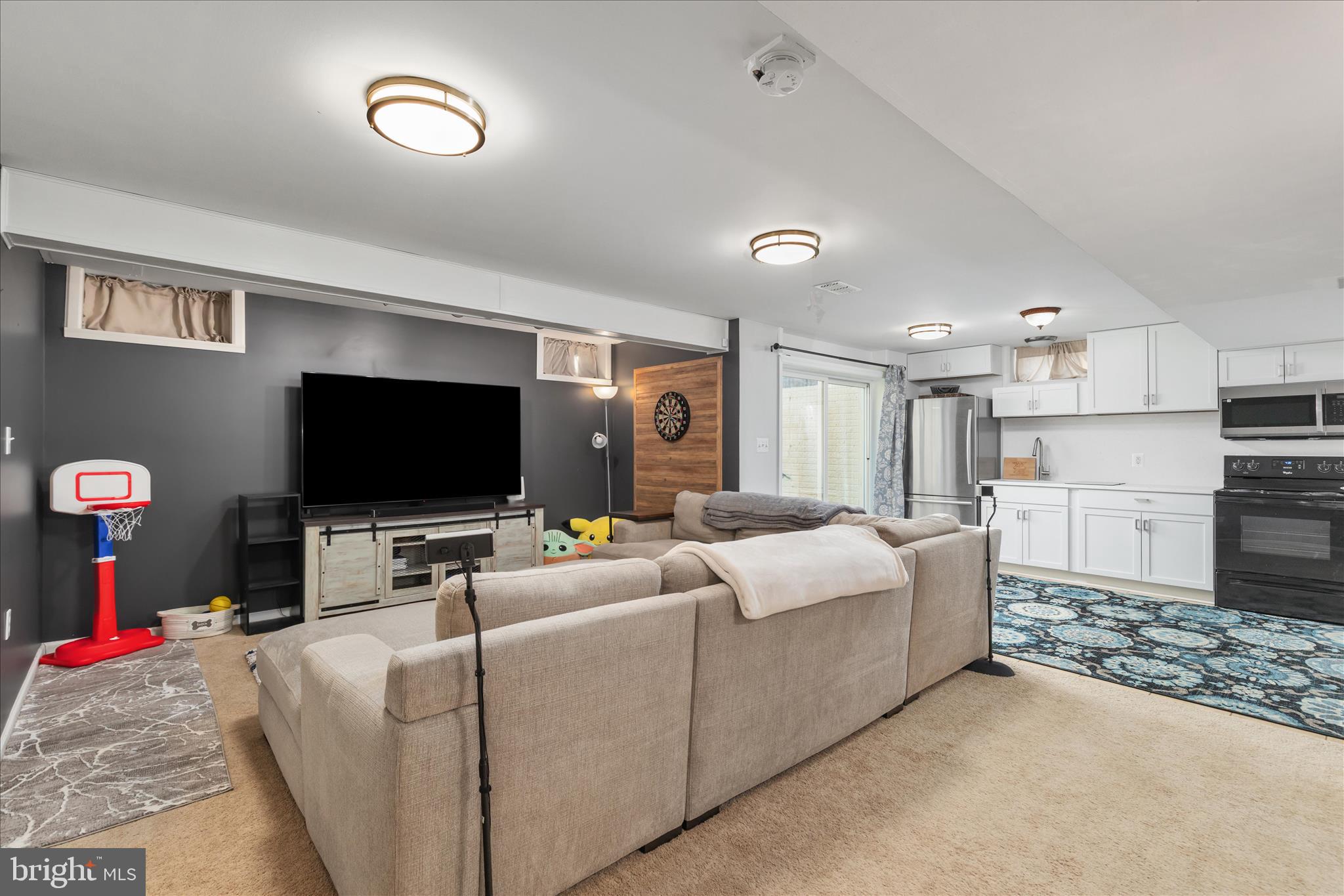 1161 Happy Ridge Drive Front Royal, VA 22630 - Photo 32 of 49 a living room with furniture and a flat screen tv