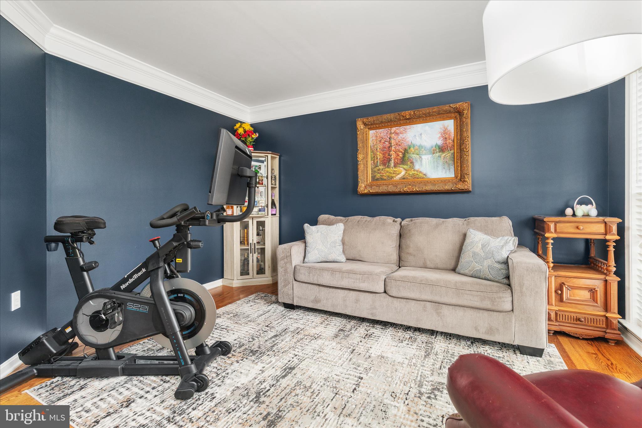 1161 Happy Ridge Drive Front Royal, VA 22630 - Photo 6 of 49 a living room with furniture a gym equipment and a wooden floor