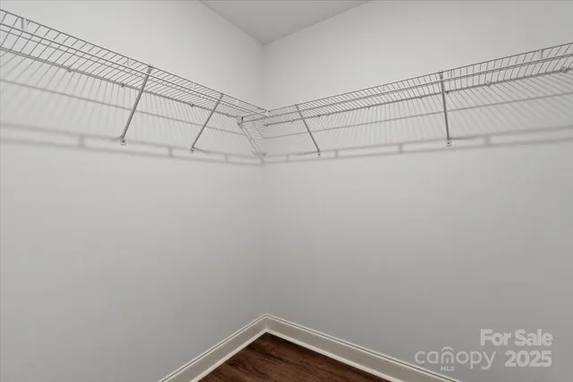 a view of a room with racks on the wall