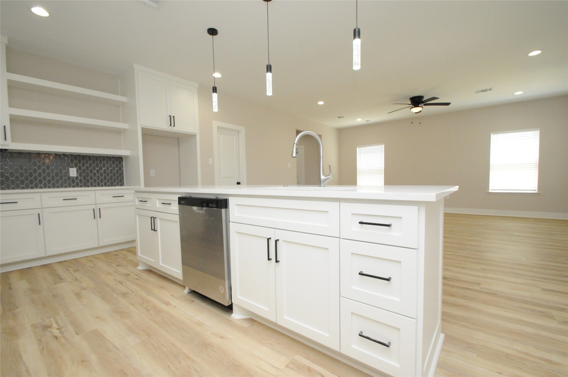 8203 Gladstone Street Houston, TX 77051 - Photo 13 of 41 a spacious bathroom with a granite countertop sink mirror and a
