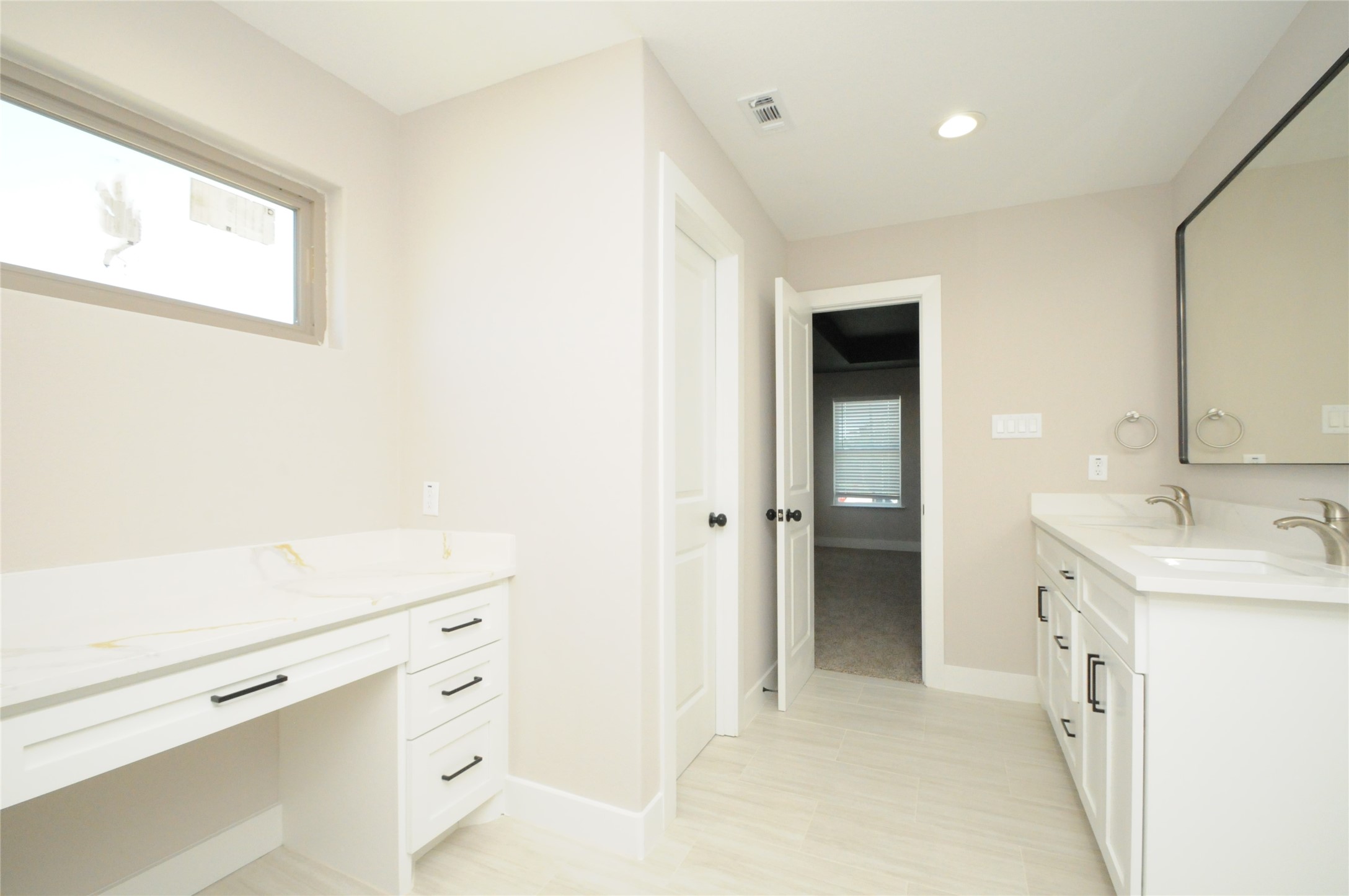 8203 Gladstone Street Houston, TX 77051 - Photo 29 of 41 a view of bathroom with dual sinks