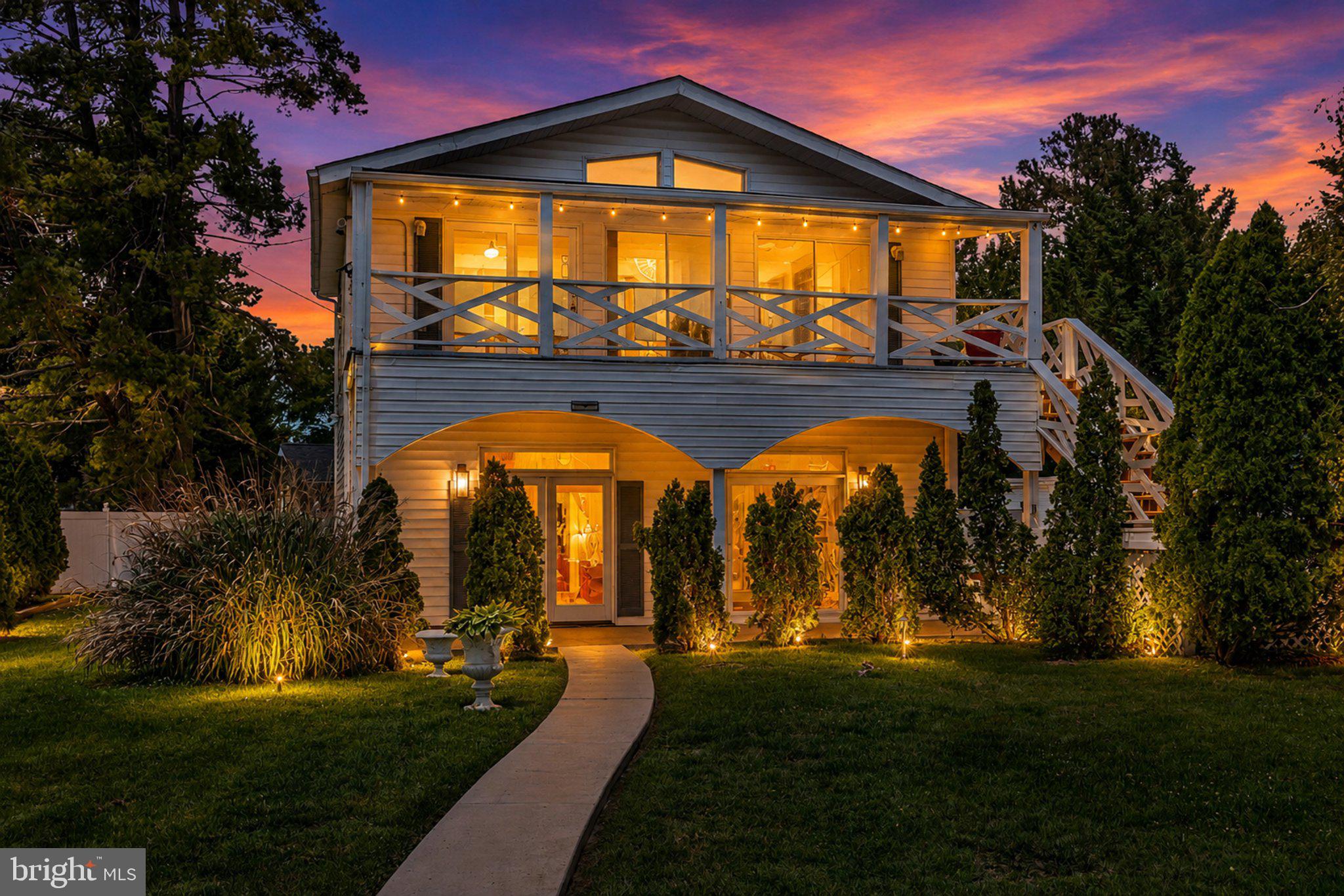 2858 Lodge Farm Road Baltimore, MD 21219 - Photo 1 of 49 Charming home aglow at sunset.