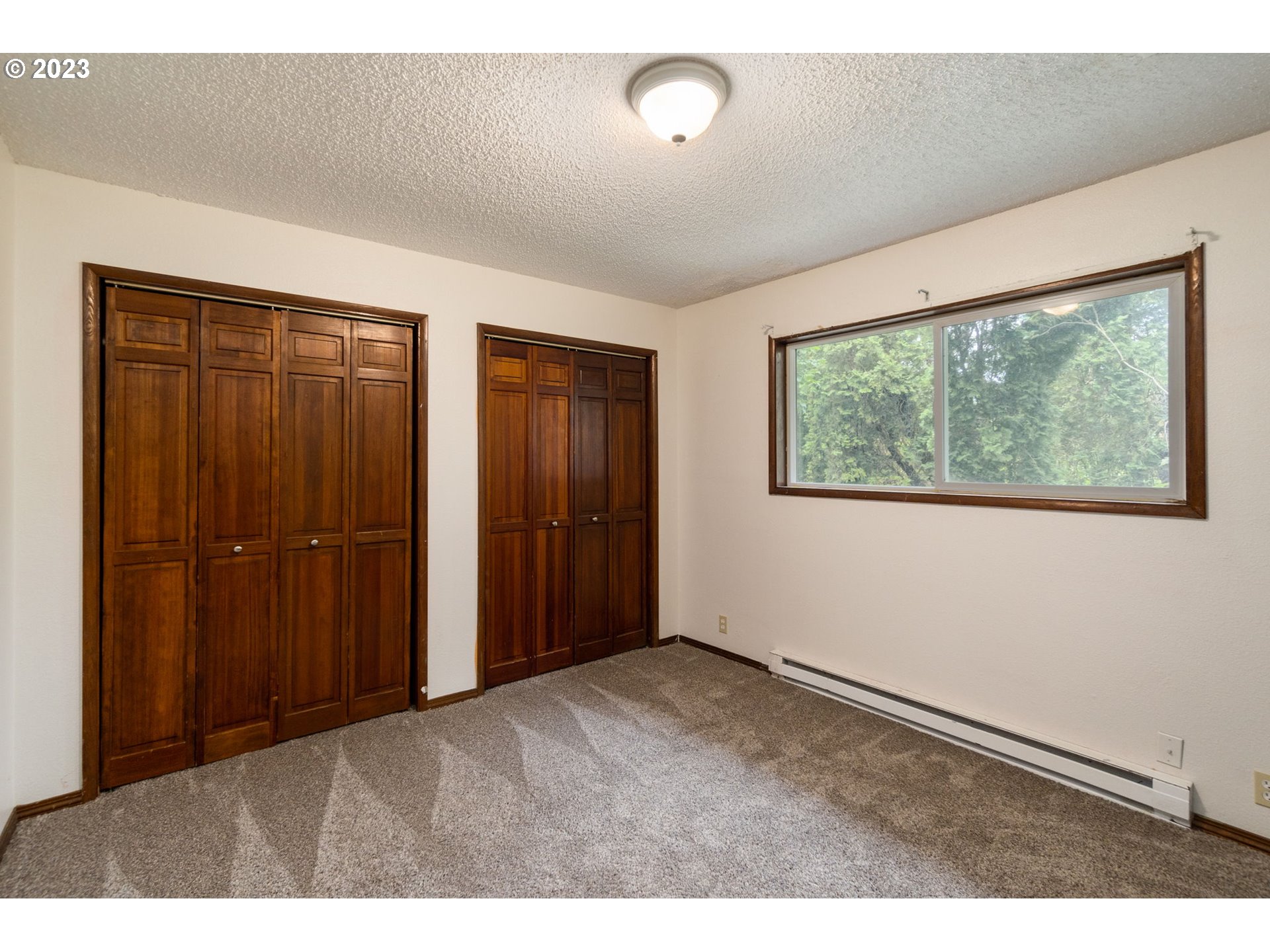 745 Southeast Littlepage Road Corbett, OR 97019 - Photo 14 of 39 a view of an empty room with a window
