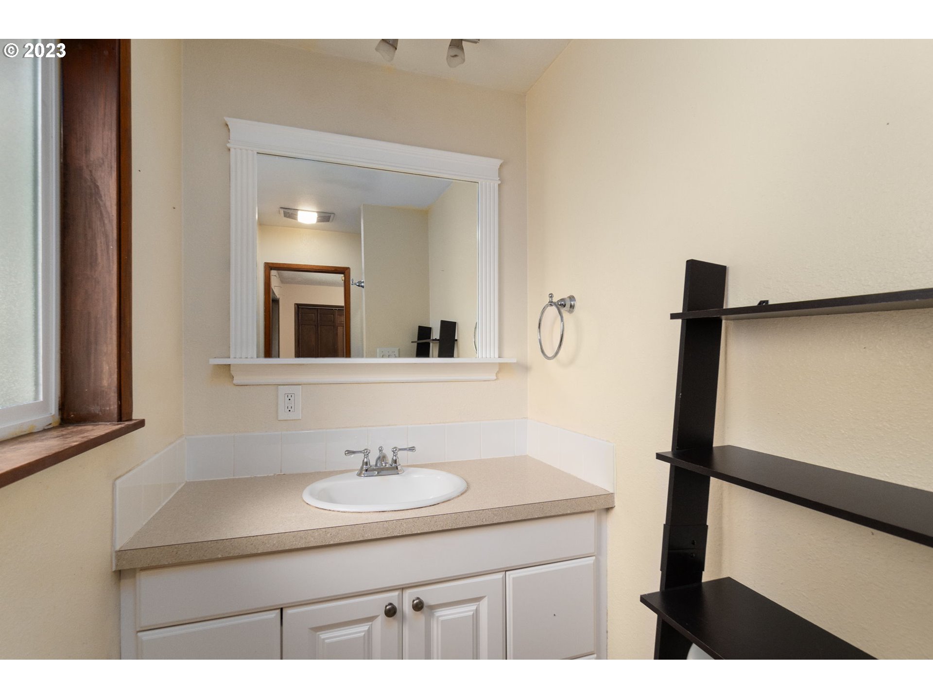 745 Southeast Littlepage Road Corbett, OR 97019 - Photo 16 of 39 a bathroom with a sink and a mirror
