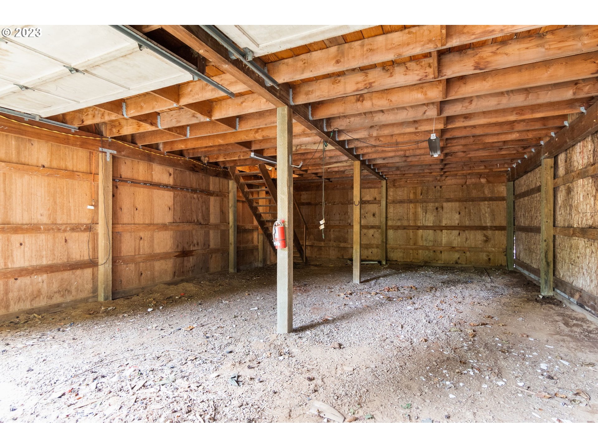 745 Southeast Littlepage Road Corbett, OR 97019 - Photo 28 of 39 a view of a room with wooden walls