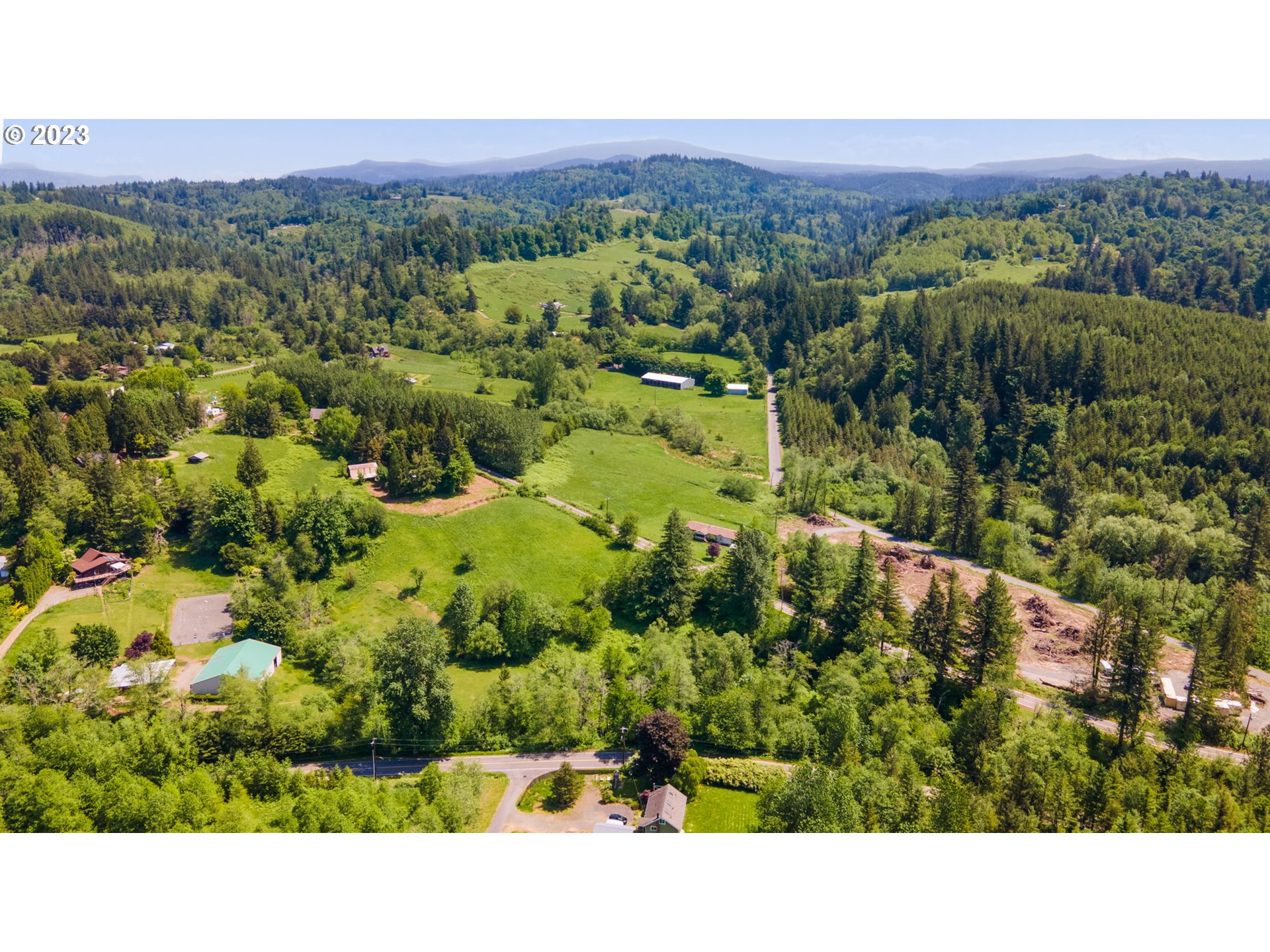 745 Southeast Littlepage Road Corbett, OR 97019 - Photo 36 of 39 a view of a city with green field
