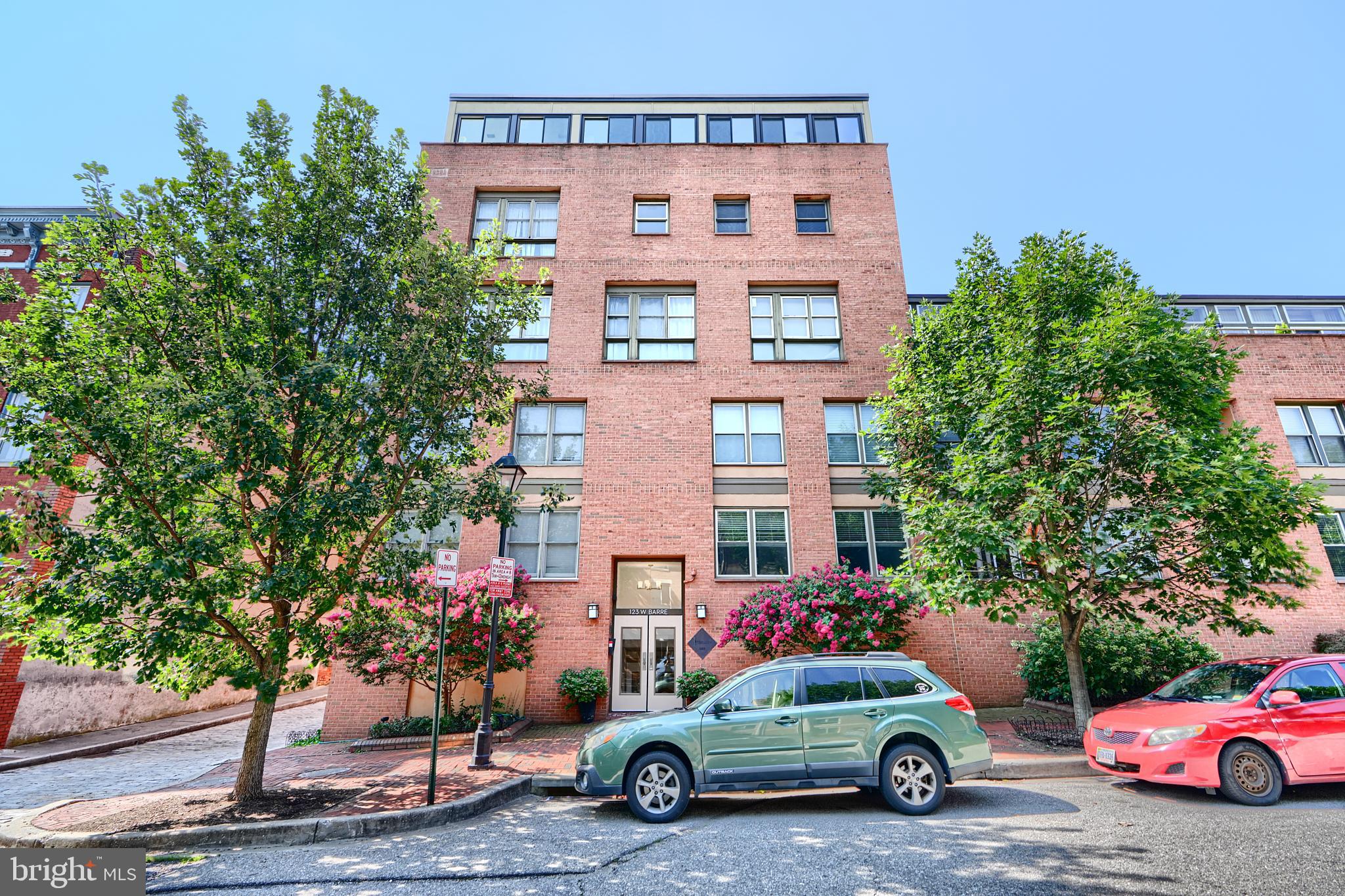 a car parked in front of a house