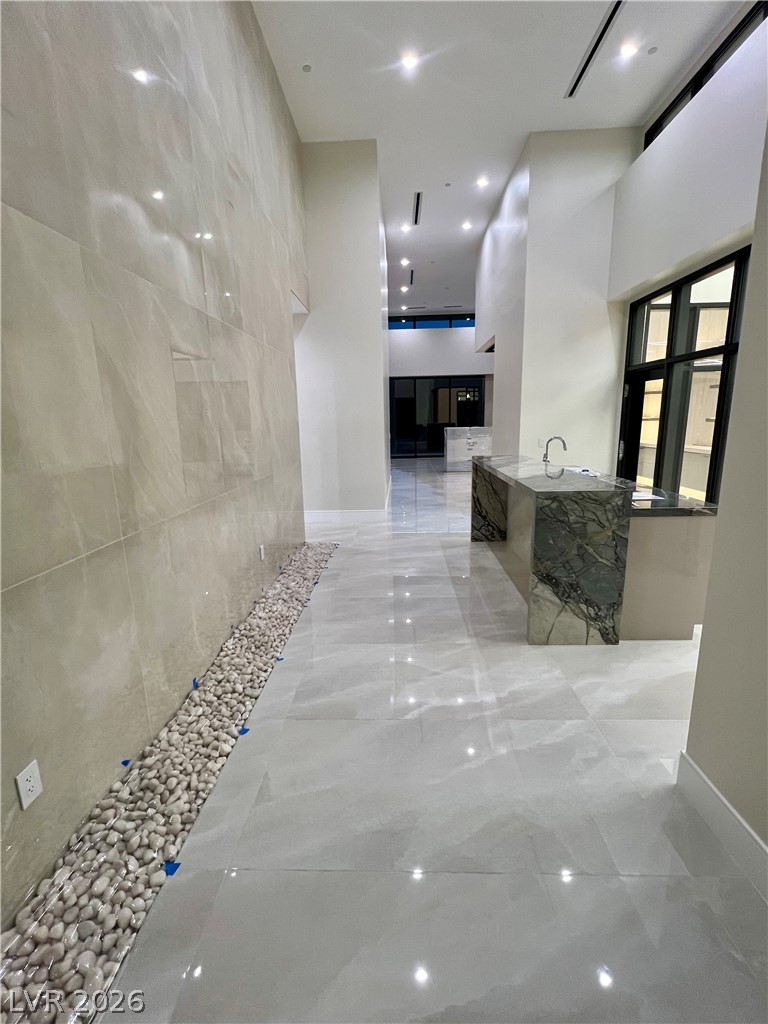 491 Cityview Ridge Drive Henderson, NV 89012 - Photo 2 of 24 Front Entry and Car Bar