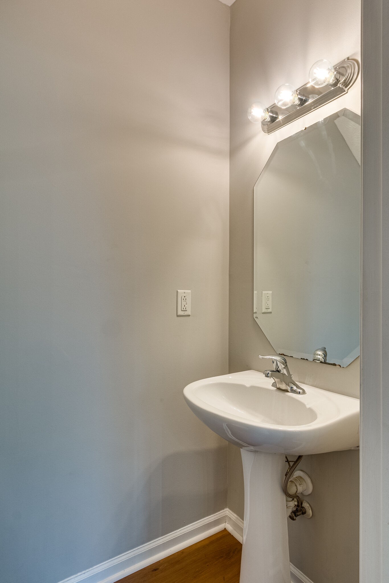 611 Buck Cherry Way Murfreesboro, TN 37128 - Photo 19 of 36 a bathroom with a sink and mirror