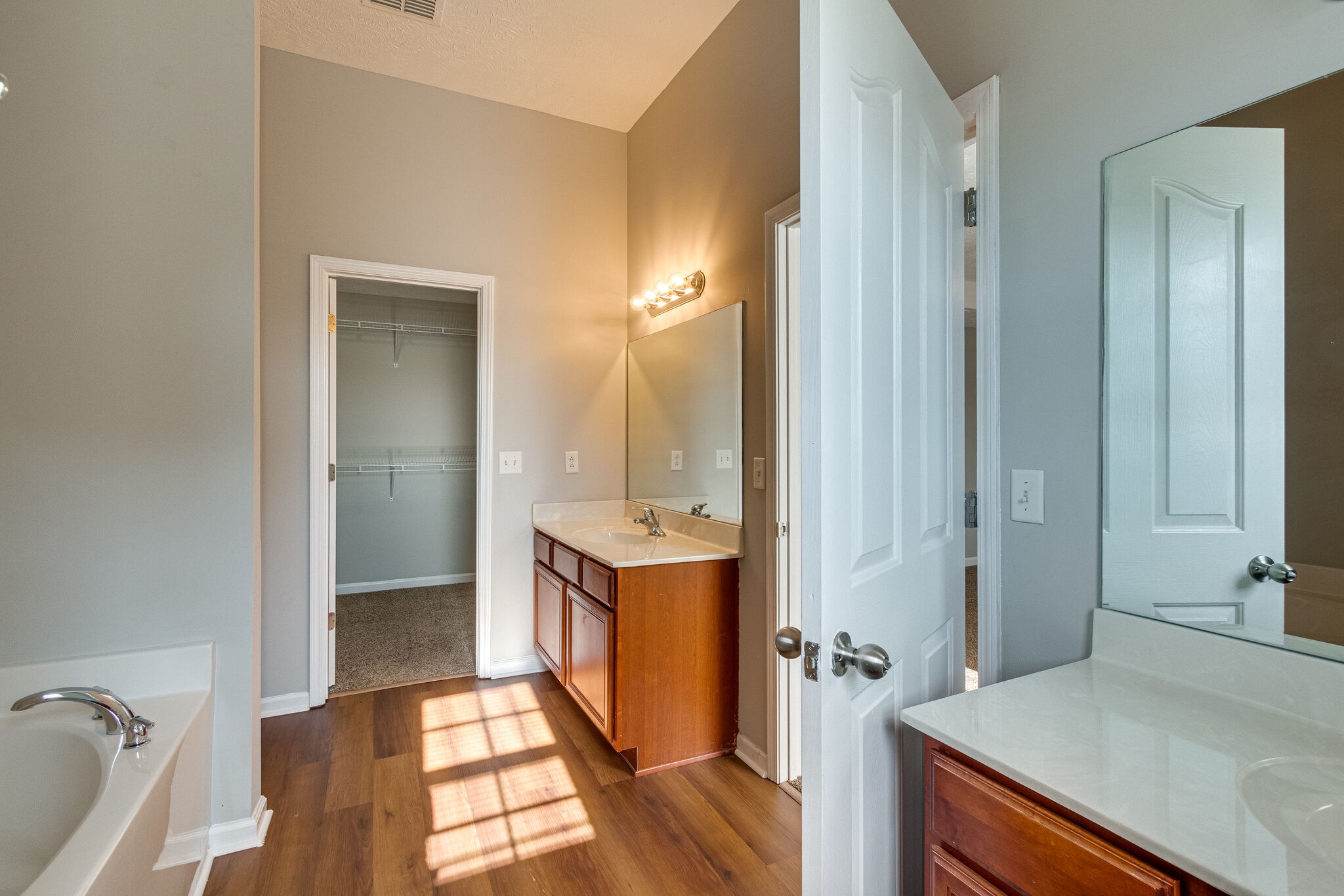 611 Buck Cherry Way Murfreesboro, TN 37128 - Photo 26 of 36 a view of a bathroom with tub and sink