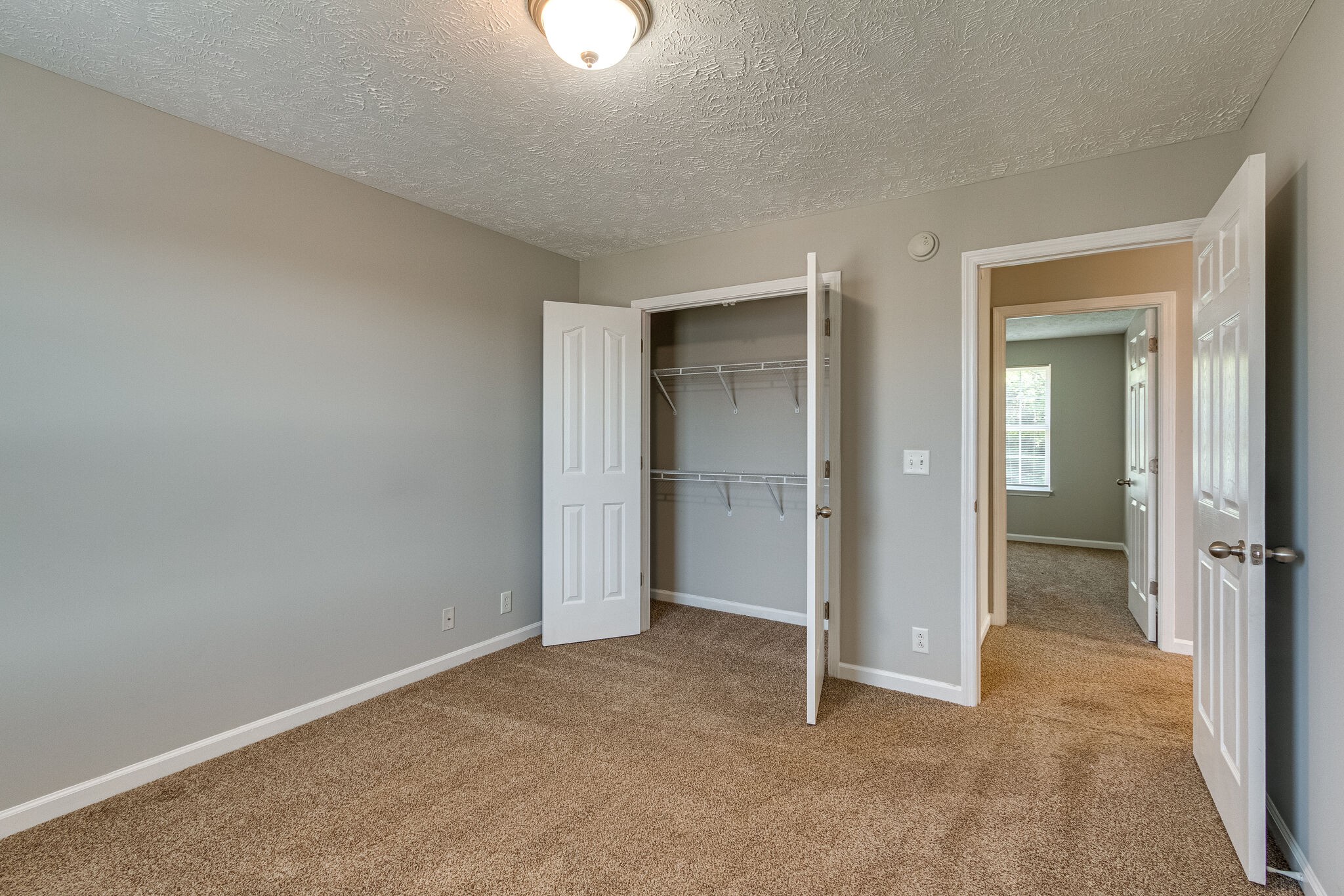 611 Buck Cherry Way Murfreesboro, TN 37128 - Photo 29 of 36 an empty room that has a glass door and closet