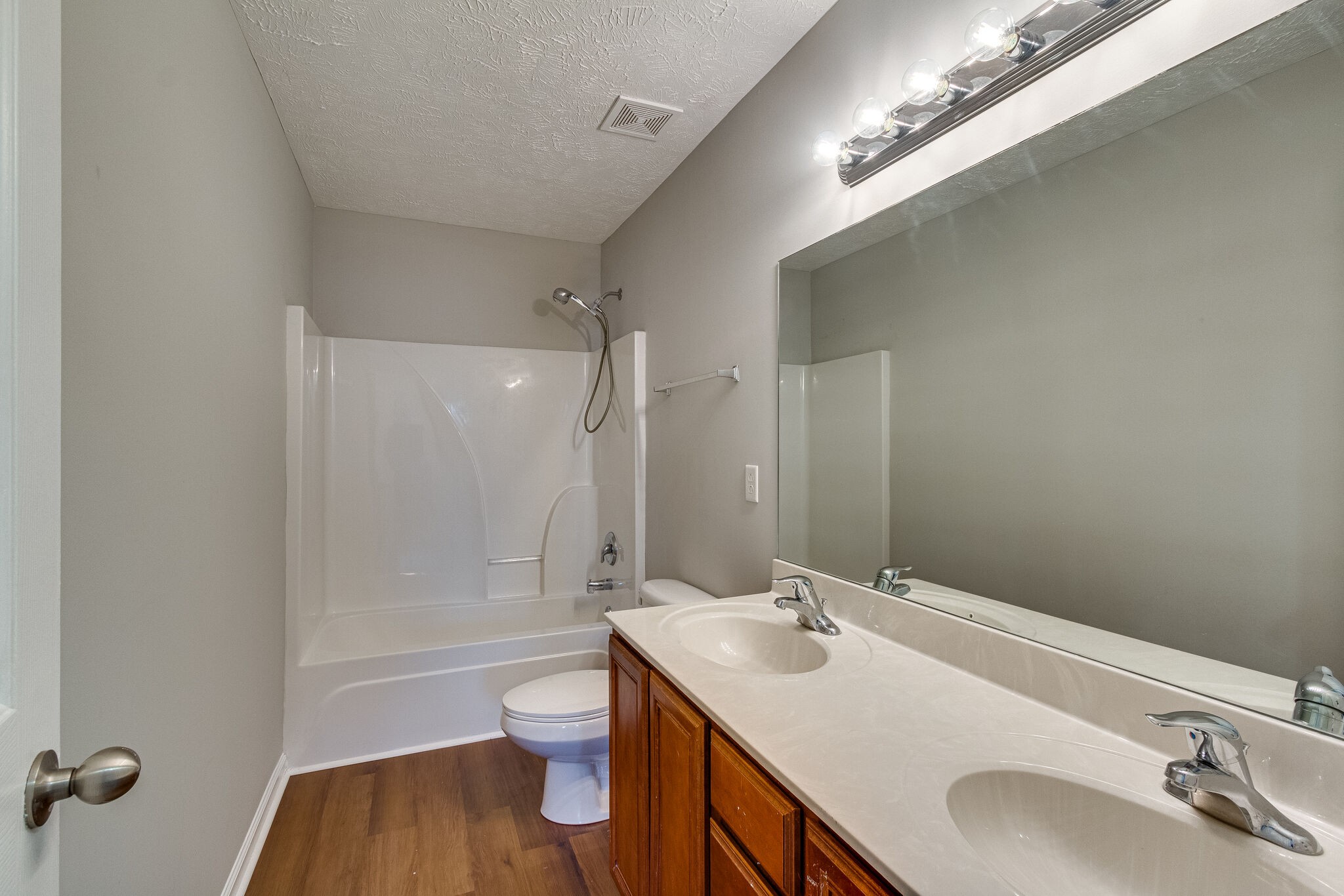 611 Buck Cherry Way Murfreesboro, TN 37128 - Photo 30 of 36 a bathroom with a sink a toilet and shower