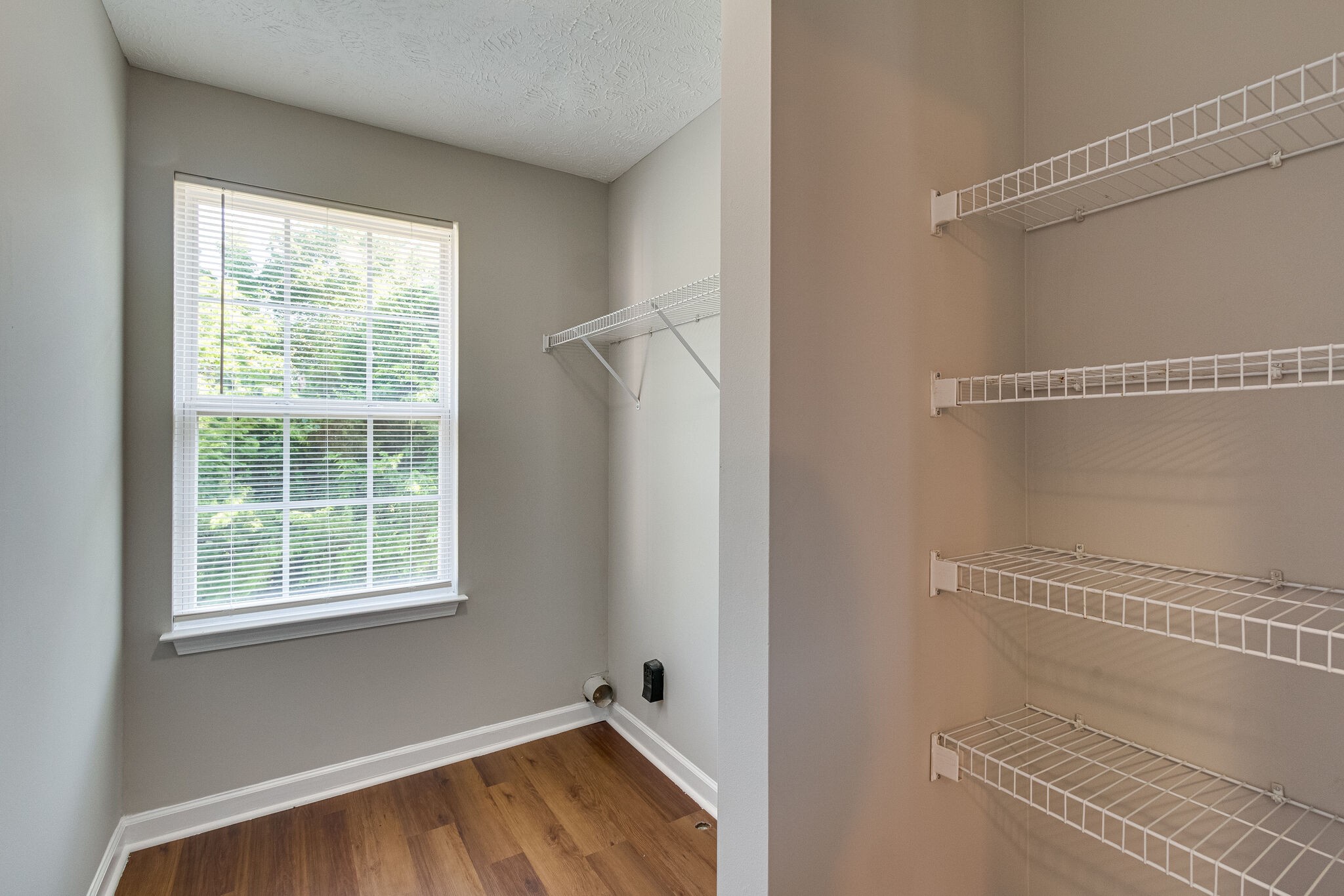 611 Buck Cherry Way Murfreesboro, TN 37128 - Photo 31 of 36 a view of a room with wooden floor and small window