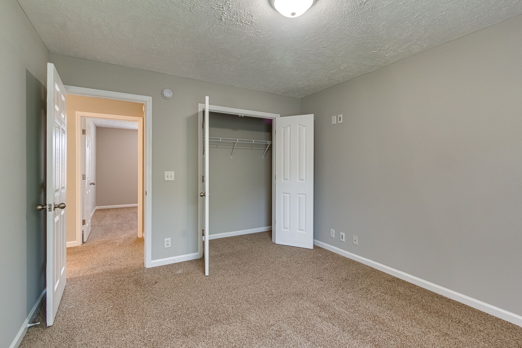 611 Buck Cherry Way Murfreesboro, TN 37128 - Photo 33 of 36 an empty room with closet and a bathroom