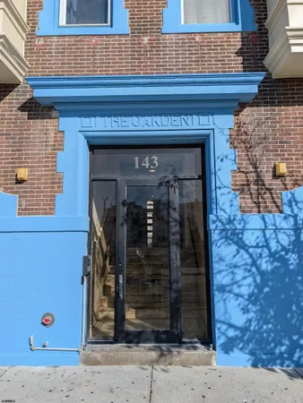 a view of a wooden door of the house