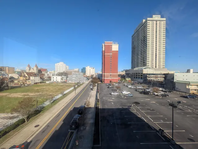 a view of swimming pool from a balcony