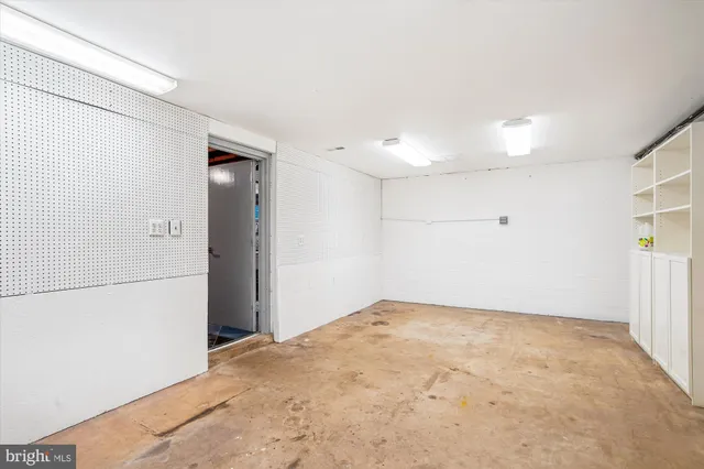 a view of a house with a yard and garage