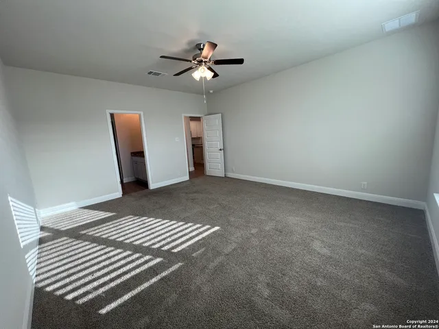 a view of a livingroom with a workspace