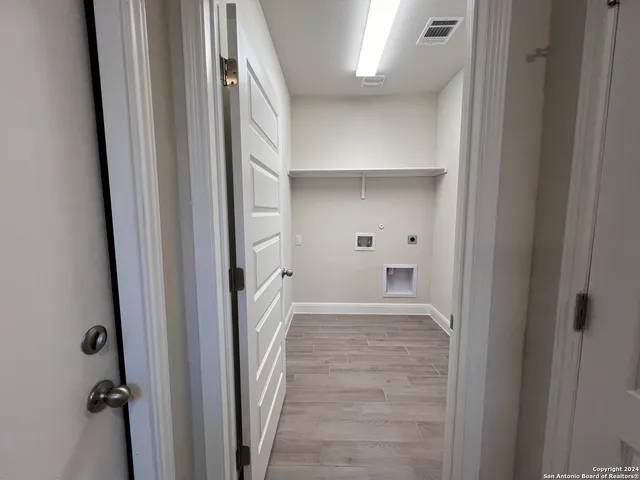 a view of an empty walk in closet