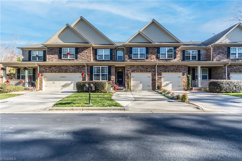 Welcome to 6205 Stonewick Drive, a luxury townhome in historic Jamestown.  Nestled on a quiet dead-end street iwith convenient access to Greensboro and High Point