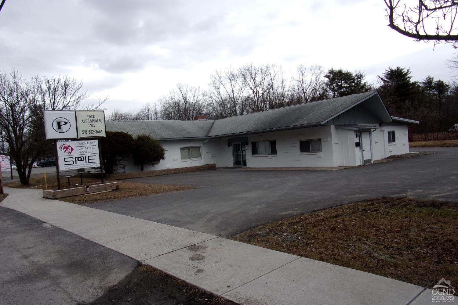 a view of a house with a garage