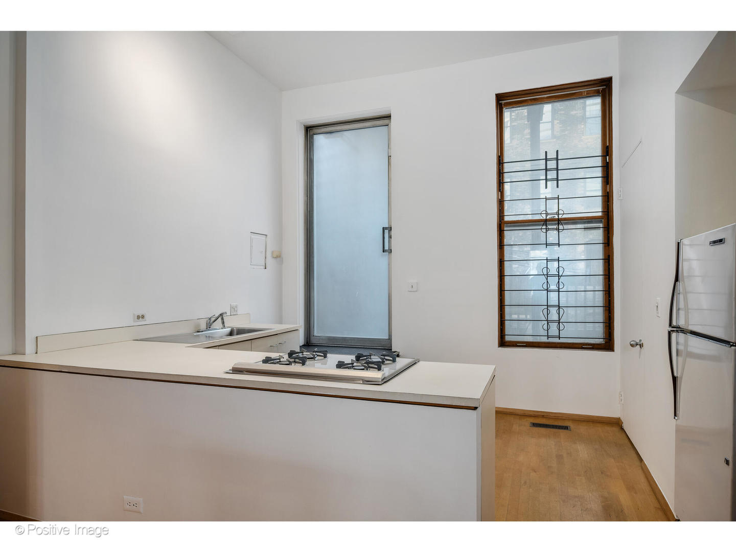 740 North Wells Street Chicago, IL 60654 - Photo 17 of 47 a bathroom with a sink and a mirror