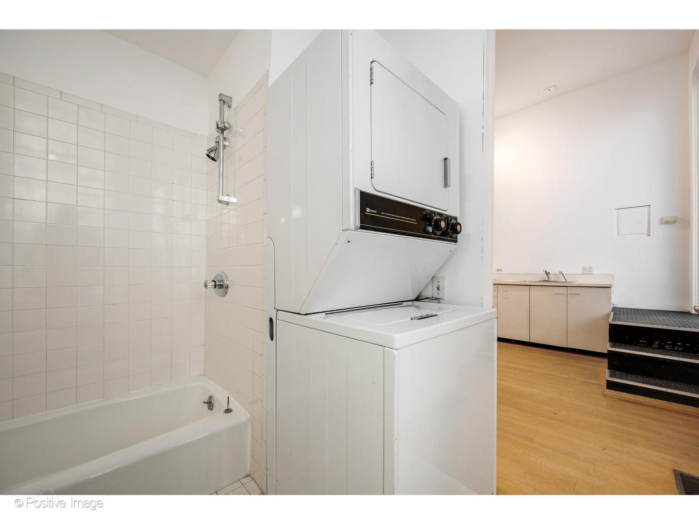 740 North Wells Street Chicago, IL 60654 - Photo 21 of 47 a bathroom with a sink a toilet and shower