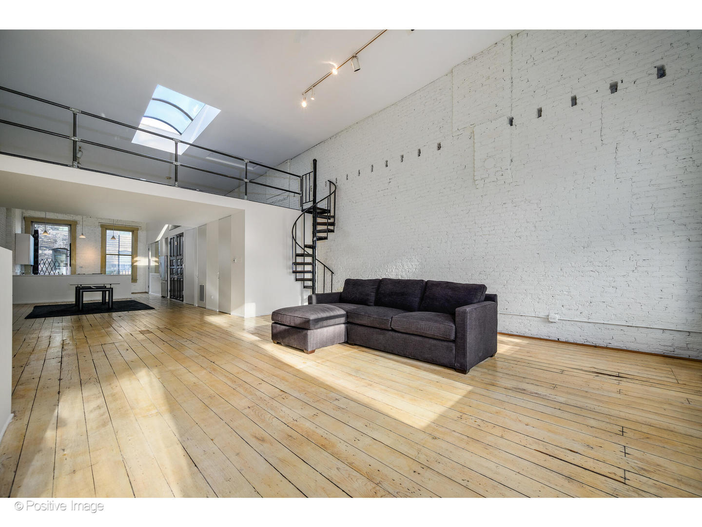 740 North Wells Street Chicago, IL 60654 - Photo 25 of 47 a living room with furniture and a wooden floor