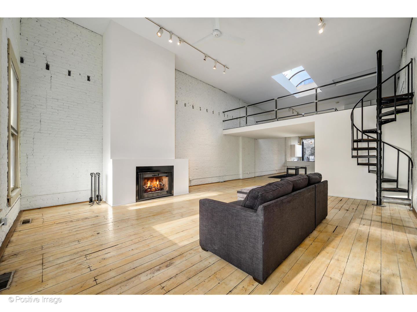 740 North Wells Street Chicago, IL 60654 - Photo 27 of 47 a living room with furniture and a fireplace