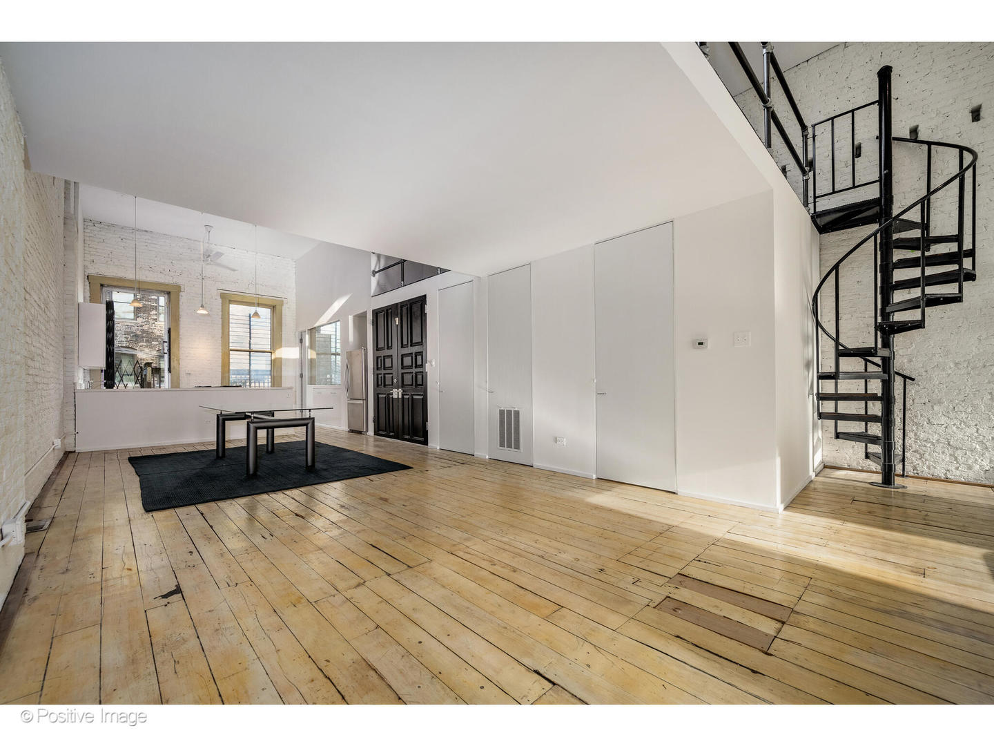 740 North Wells Street Chicago, IL 60654 - Photo 28 of 47 a view of empty room with wooden floor and stairs