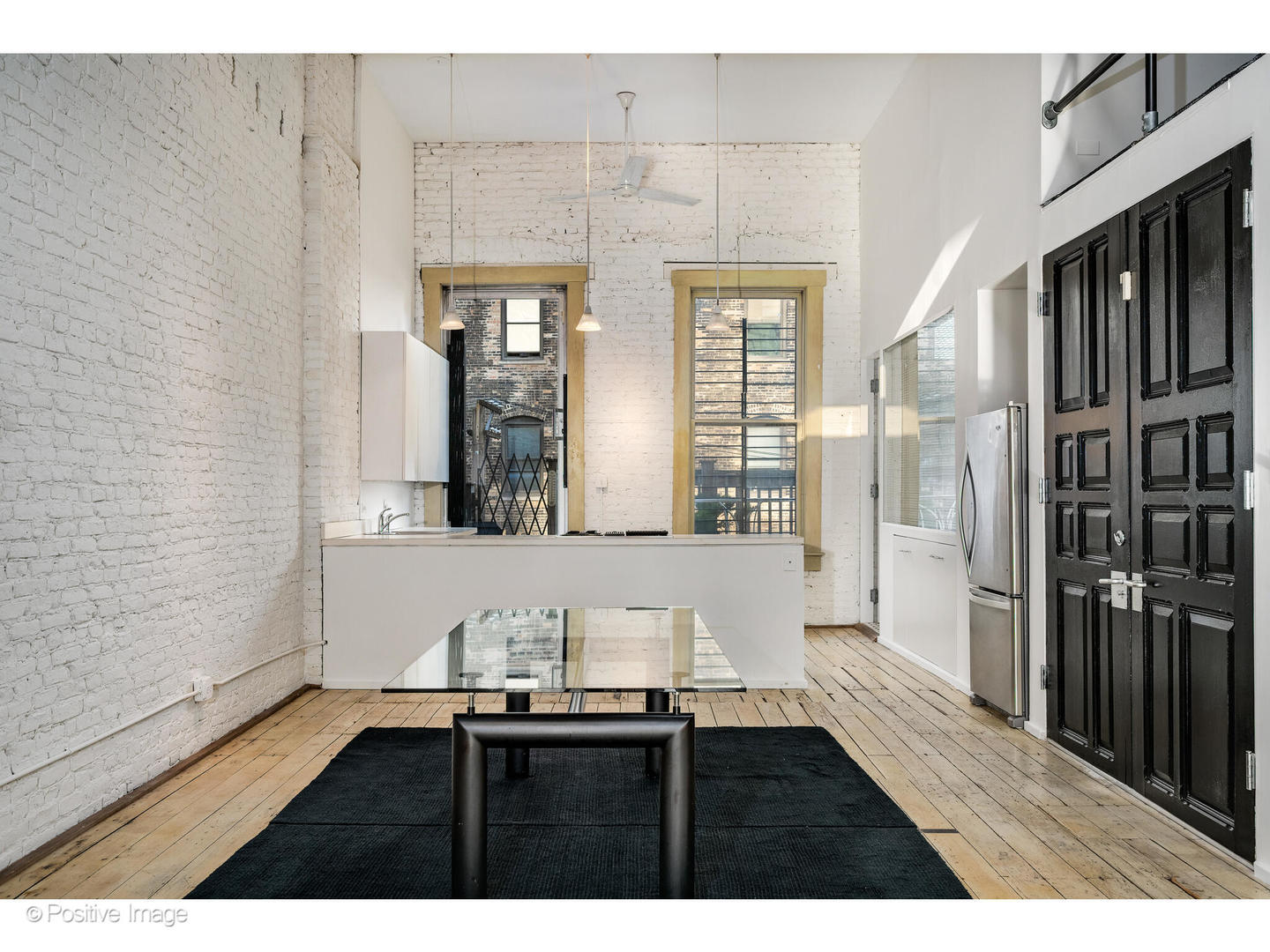 740 North Wells Street Chicago, IL 60654 - Photo 31 of 47 a living room with furniture and large window
