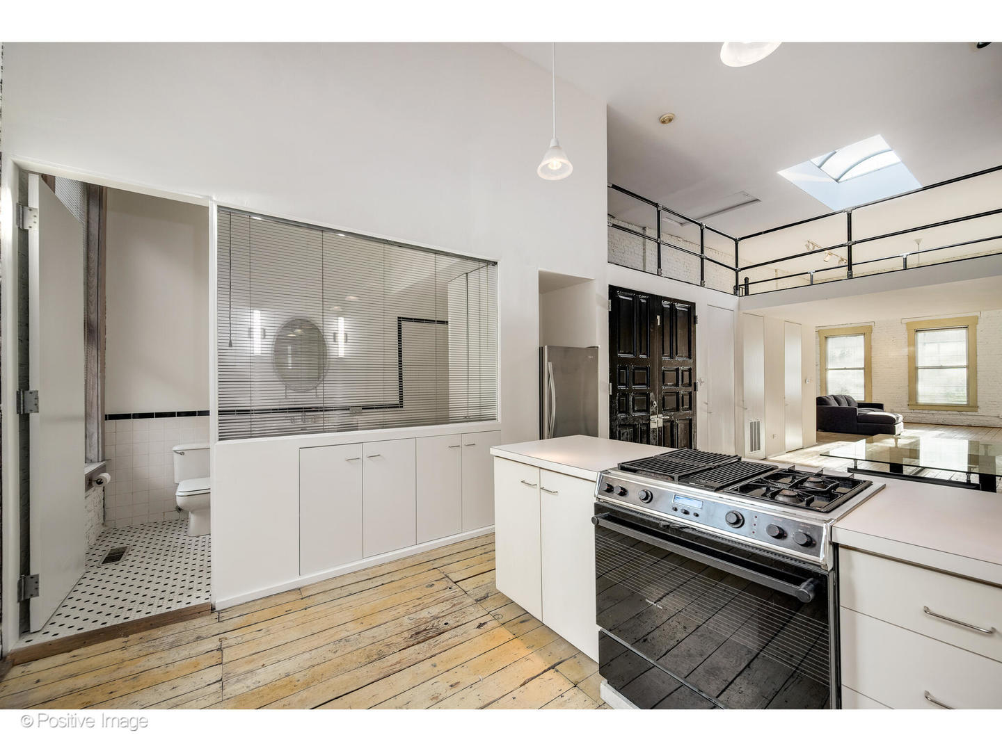 740 North Wells Street Chicago, IL 60654 - Photo 36 of 47 a kitchen with a stove a refrigerator and a sink