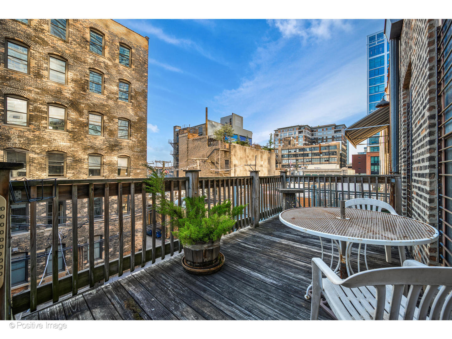 740 North Wells Street Chicago, IL 60654 - Photo 39 of 47 a view of balcony with wooden floor