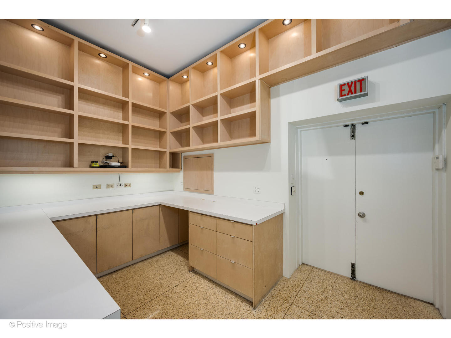 740 North Wells Street Chicago, IL 60654 - Photo 9 of 47 a kitchen with a sink and cabinets