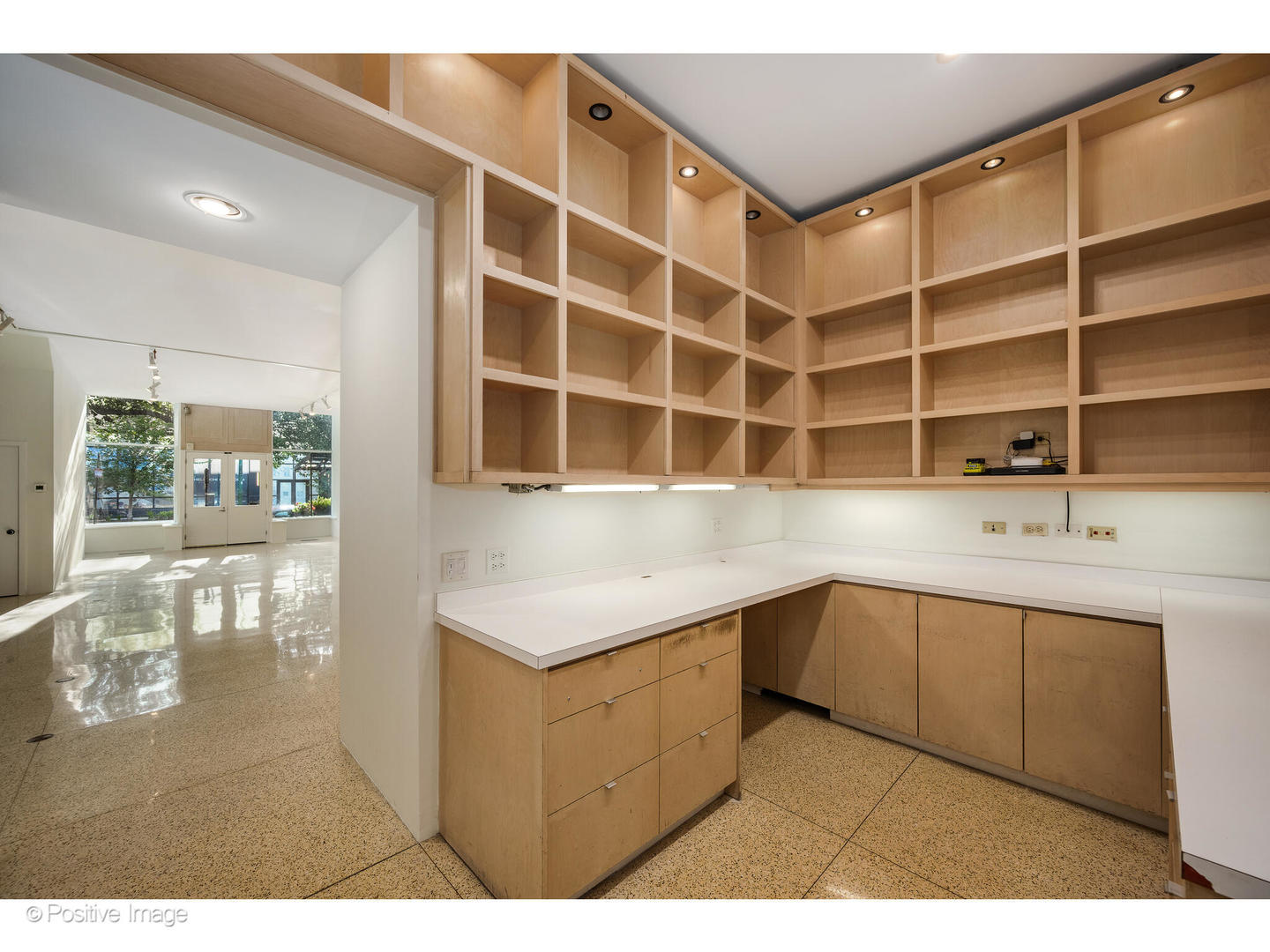 740 North Wells Street Chicago, IL 60654 - Photo 10 of 47 a kitchen with a sink cabinets and a table