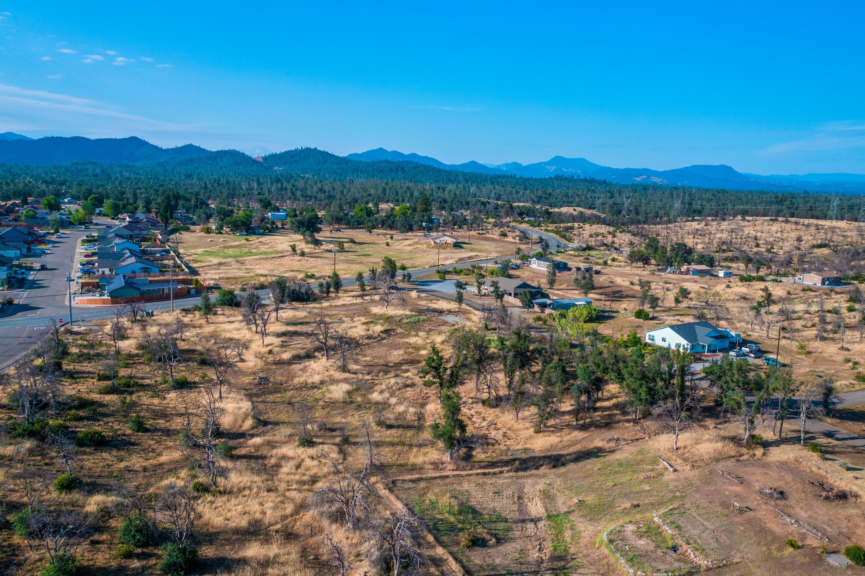 17007 Keswick Dam Road Redding, CA 96003 - Photo 12 of 20 a view of a lake with mountains in the background