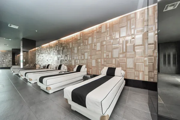 a bathroom with a sink and mirror