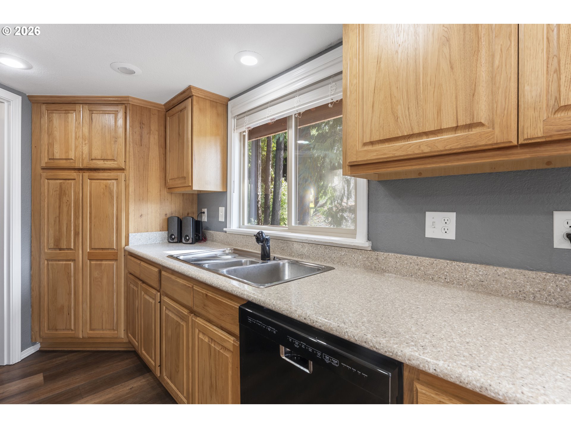 2453 Stephanie Lane North Bend, OR 97459 - Photo 13 of 48 a kitchen with a sink and cabinets