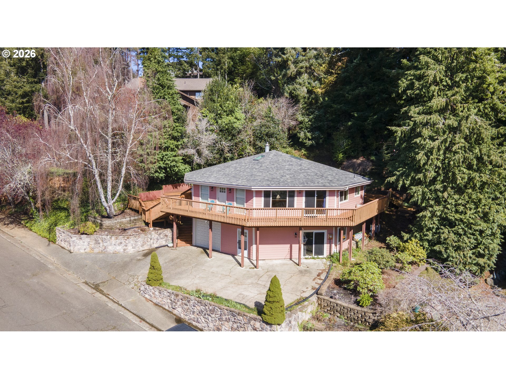 2453 Stephanie Lane North Bend, OR 97459 - Photo 2 of 48 a view of a house with yard and sitting area