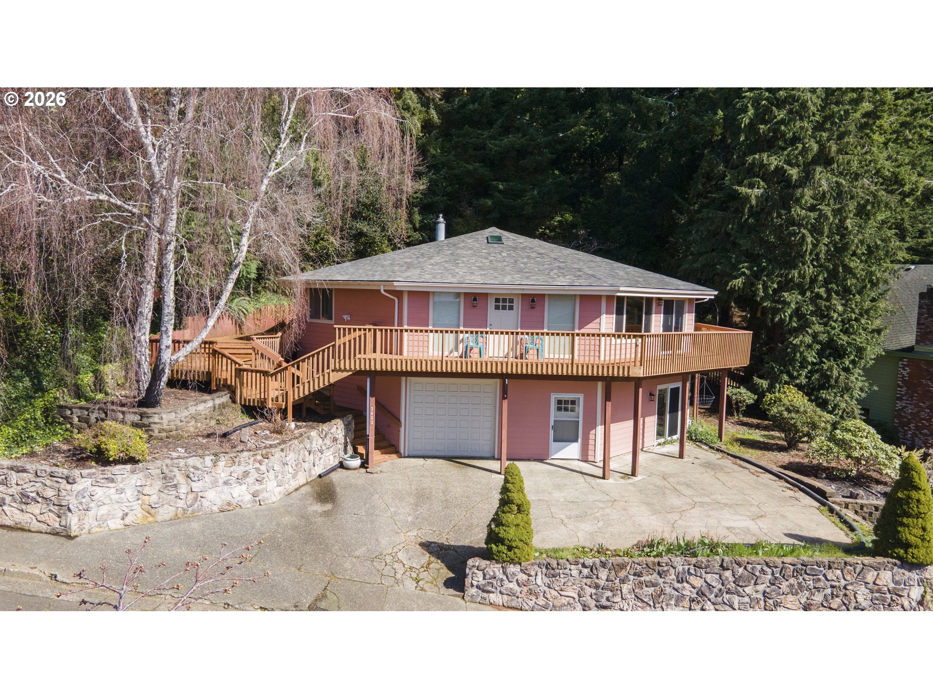 2453 Stephanie Lane North Bend, OR 97459 - Photo 43 of 48 a balcony with furniture and a garden