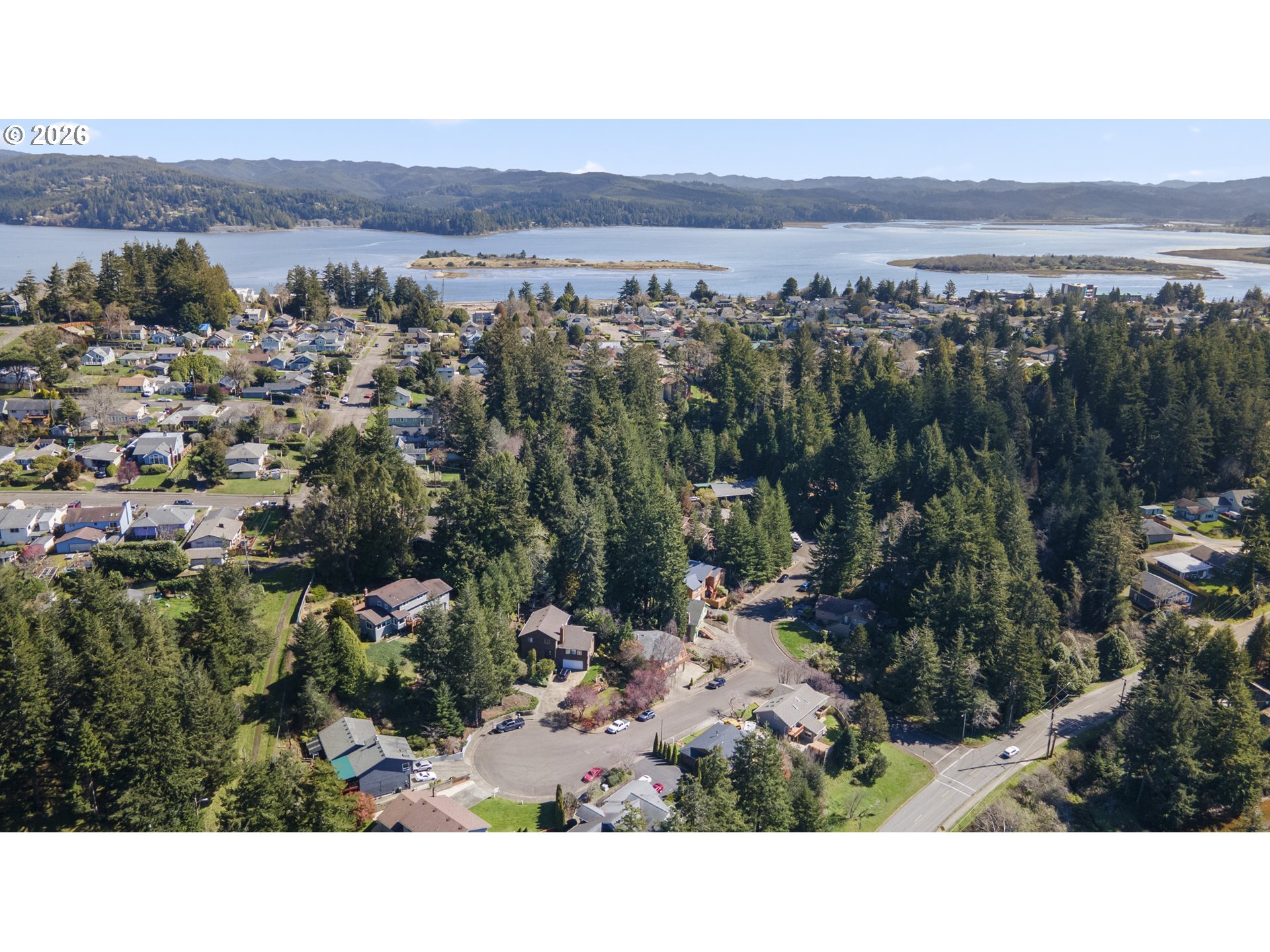 2453 Stephanie Lane North Bend, OR 97459 - Photo 48 of 48 a view of a city and mountains
