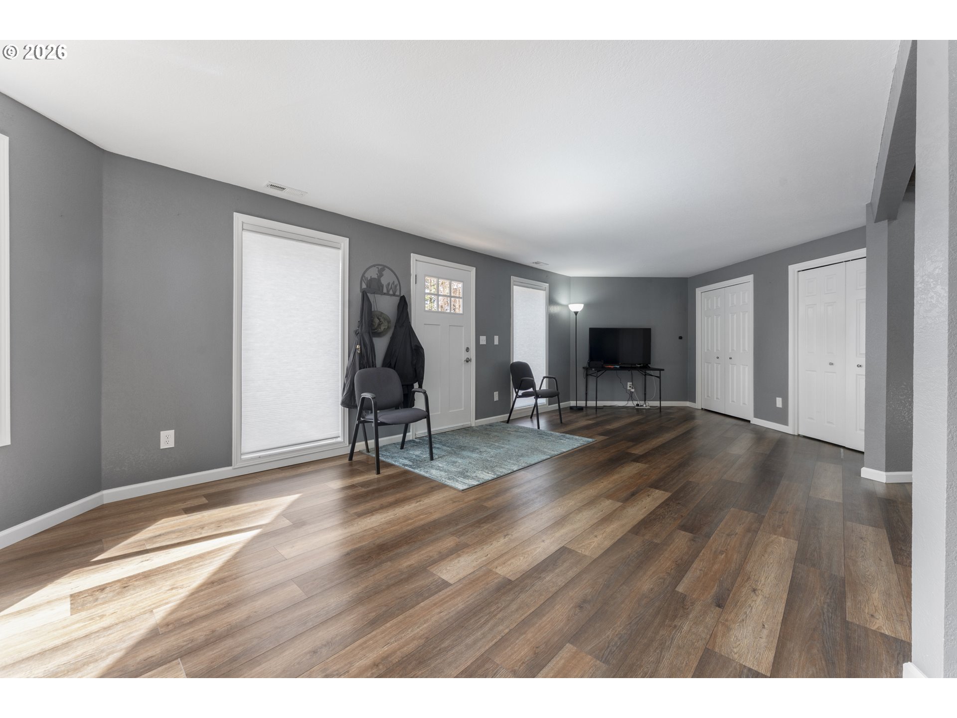 2453 Stephanie Lane North Bend, OR 97459 - Photo 8 of 48 a view of empty room with wooden floor